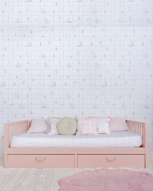 Cama Palito Evolutiva com Gavetões 4 em 1 na cor Rosa, em modo sofá, com almofadas, no quarto.