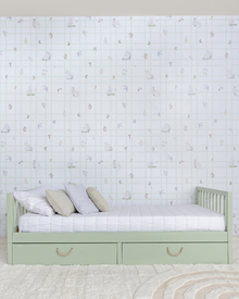 Cama Palito Evolutiva com Gavetões 4 em 1 na cor Verde, em modo sofá, vista em ângulo no quarto.