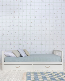 Cama Palito Evolutiva com Gavetões 4 em 1 na cor Off White, em modo sofá, vista em ângulo no quarto.